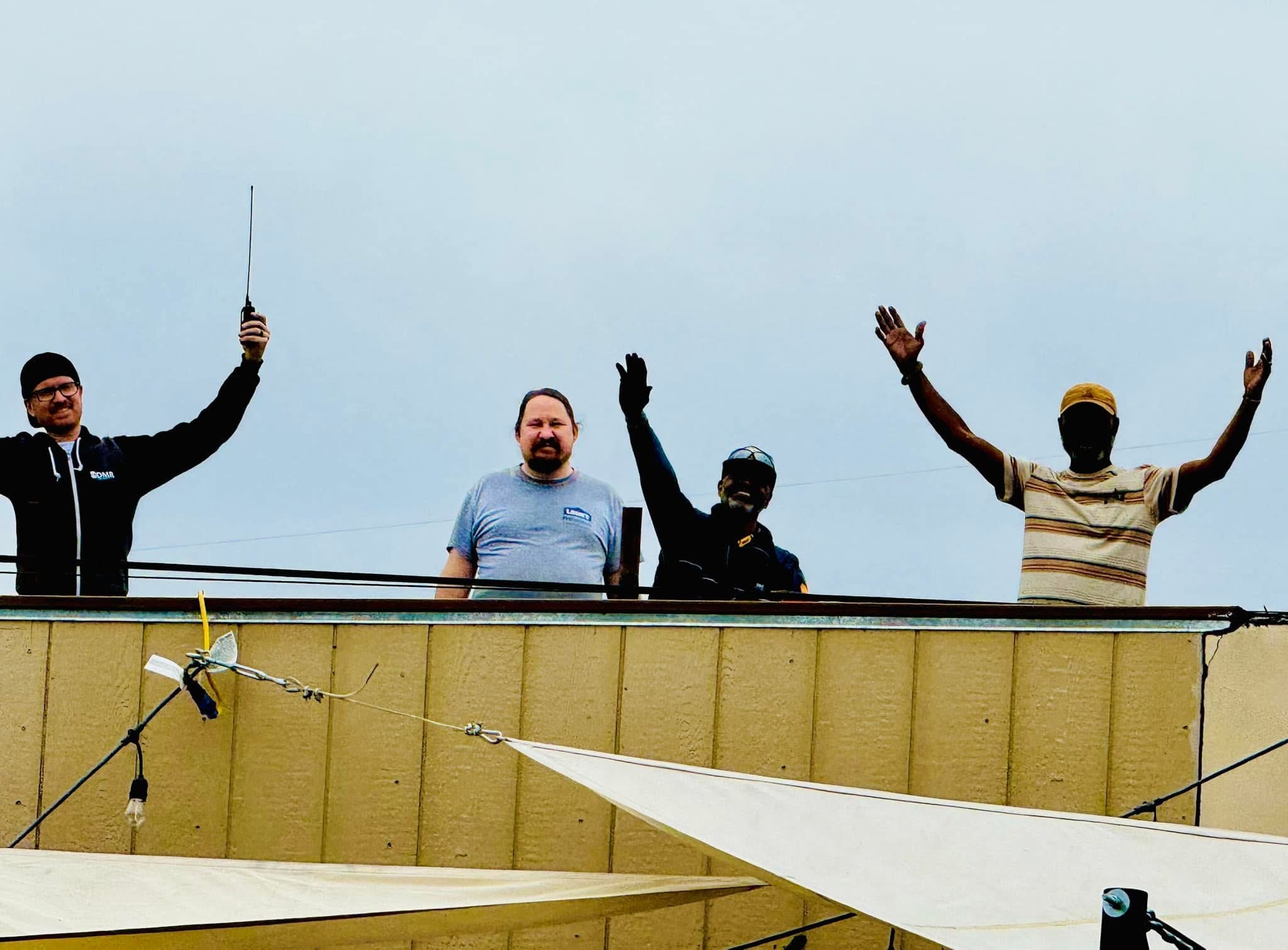 Amateur radio field day operations with antennas and outdoor equipment setup