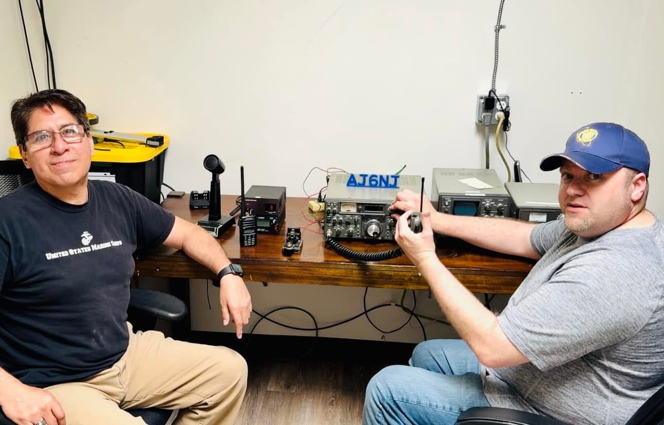 Ham radio operators using transceivers and radio equipment at American Legion Post 6